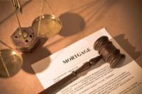 Mortgage papers with gavel